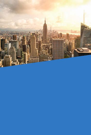 Skyline of downtown New York, Brooklyn Bridge and Manhattan at the early morning sunlight.