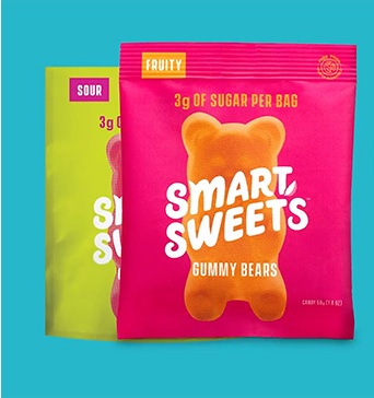 Colorful gummy bears arranged in a heart shape, highlighting SmartSweets success story.