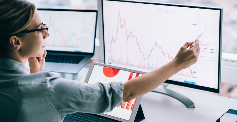 Businesswoman works on a financial forecast.