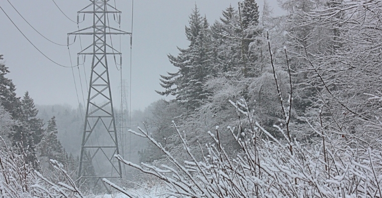 Image of transmission towers during winter