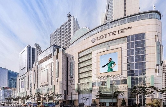 Exterior view of a large Lotte department store building in South Korea