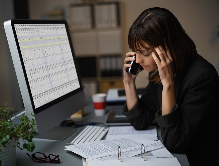 Worried businesswoman on computer