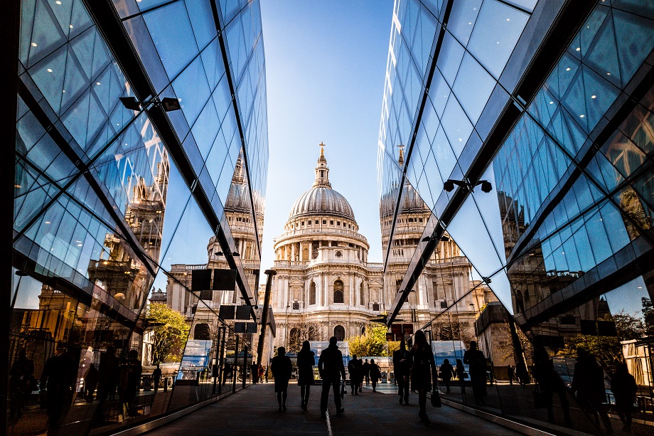 Futuristic architecture blends with traditional church in London