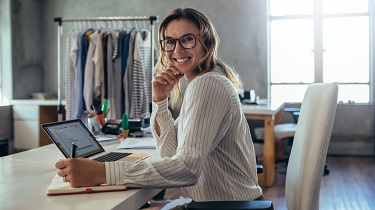 women business owner on laptop