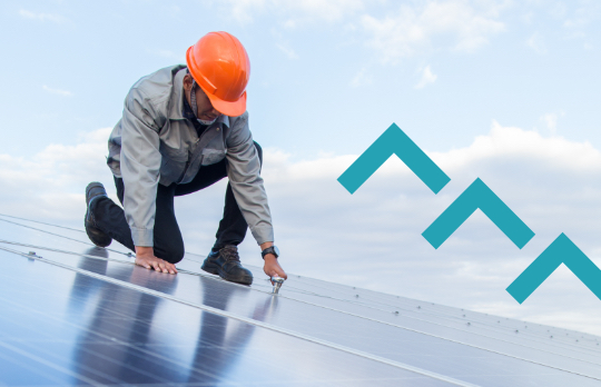 Technician working on solar panels