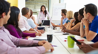 Woman leading a board meeting